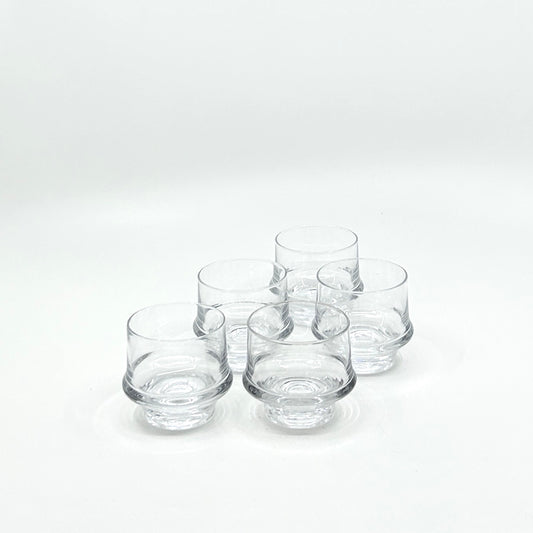 Vintage Marski Trinkgläser von Tapio Wirkkala für Iittala, Finnland, 1970er-Jahre. Klarglas im Stil der skandinavischen Moderne mit charakteristischem eingezogenem Standfuß. 5-er Set