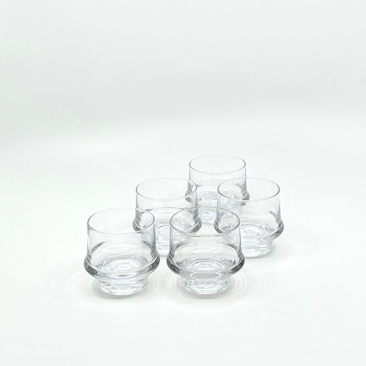 Vintage Marski Trinkgläser von Tapio Wirkkala für Iittala, Finnland, 1970er-Jahre. Klarglas im Stil der skandinavischen Moderne mit charakteristischem eingezogenem Standfuß. 5-er Set